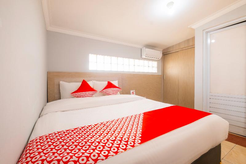 Super OYO 2405 The Karins Guesthouse Syariah - Oda
