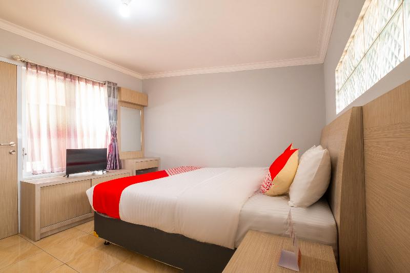 Super OYO 2405 The Karins Guesthouse Syariah - Oda