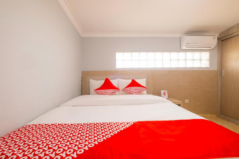 Super OYO 2405 The Karins Guesthouse Syariah - Oda