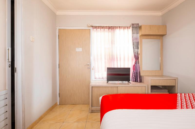 Super OYO 2405 The Karins Guesthouse Syariah - Oda