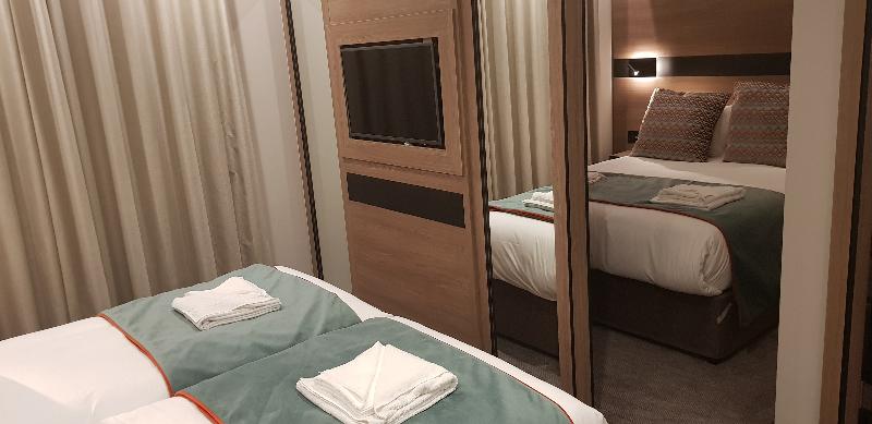 Merit Kensington Hotel - Oda