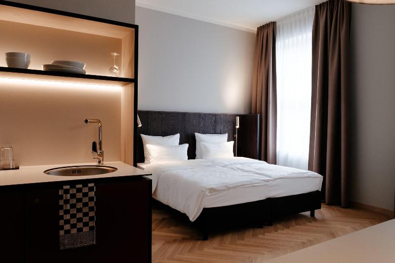 Melter Hotel Apartments - Oda
