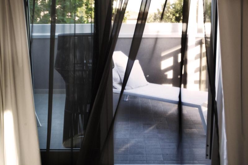 Q Hotel - Oda