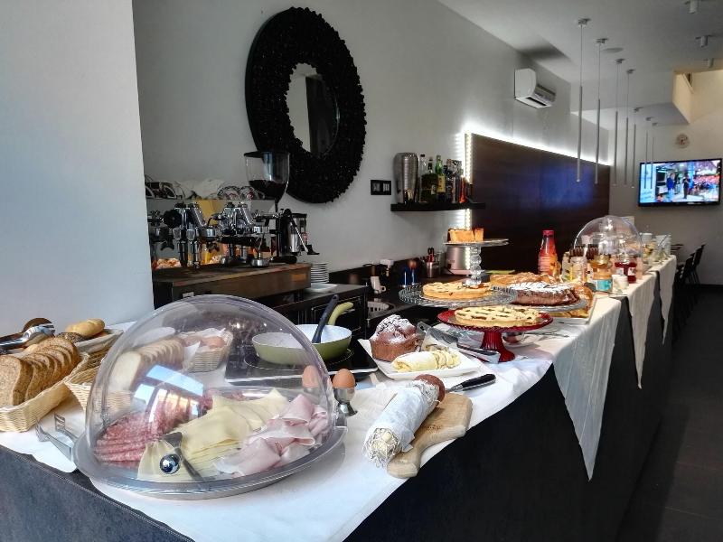 Q Hotel - Restoran