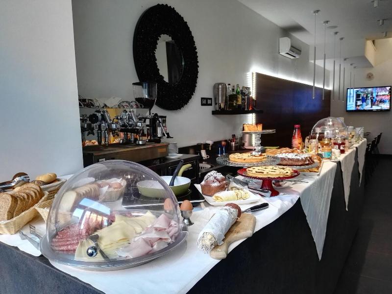 Q Hotel - Restoran