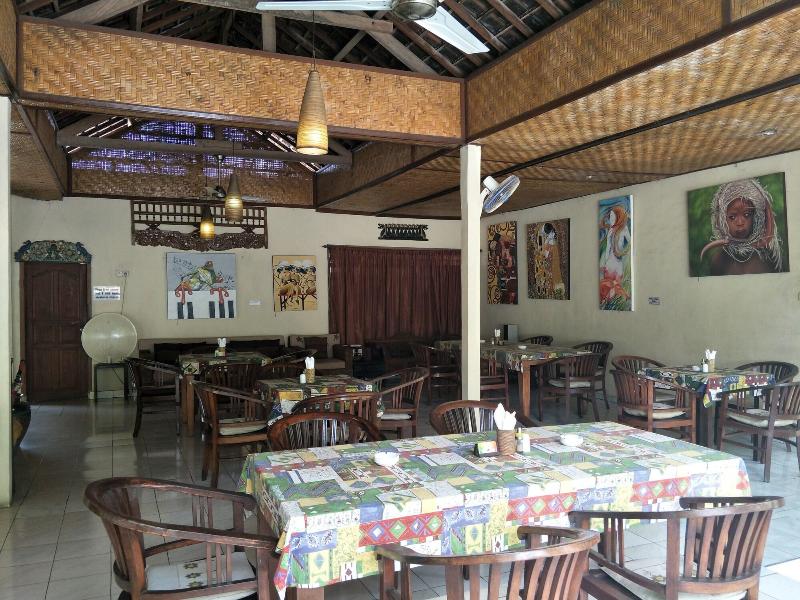 Temple Cafe Seaside Cottages - Restoran
