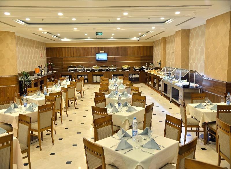 Nozol Royal Inn Hotel - Restoran