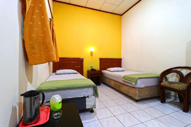 Hotel Sumatera by ZUZU - Oda