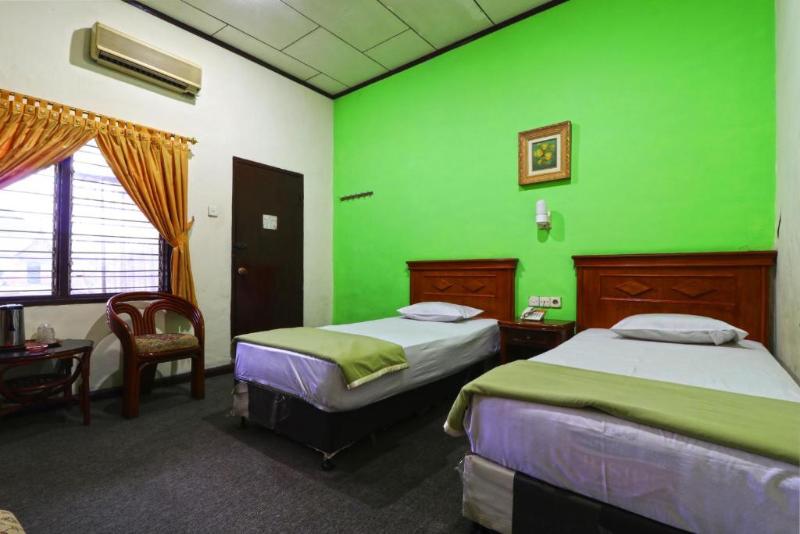 Hotel Sumatera by ZUZU - Oda