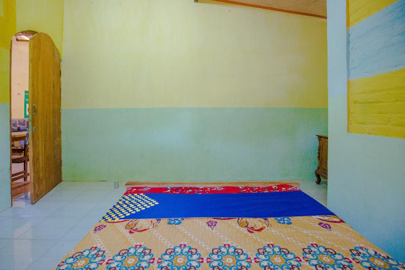 Spot On 1762 Gandrung Payungan Family Inn - Oda