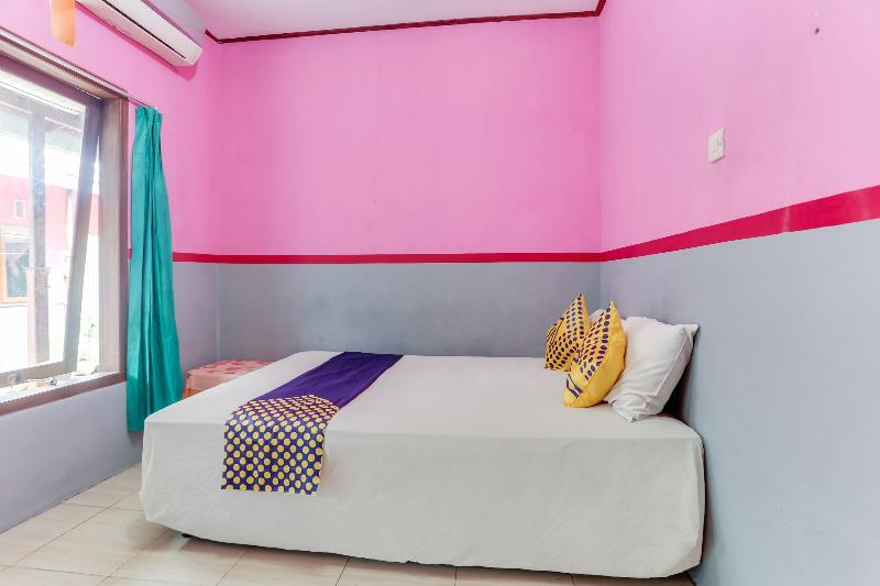 Ijen Traveller Homestay by ZUZU - Oda