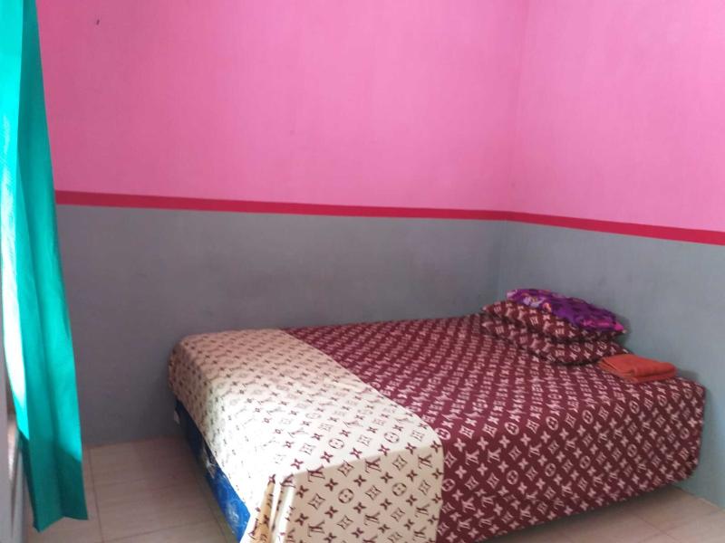 Ijen Traveller Homestay by ZUZU - Oda