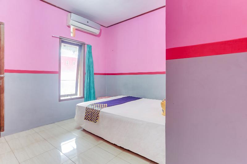 Ijen Traveller Homestay by ZUZU - Oda