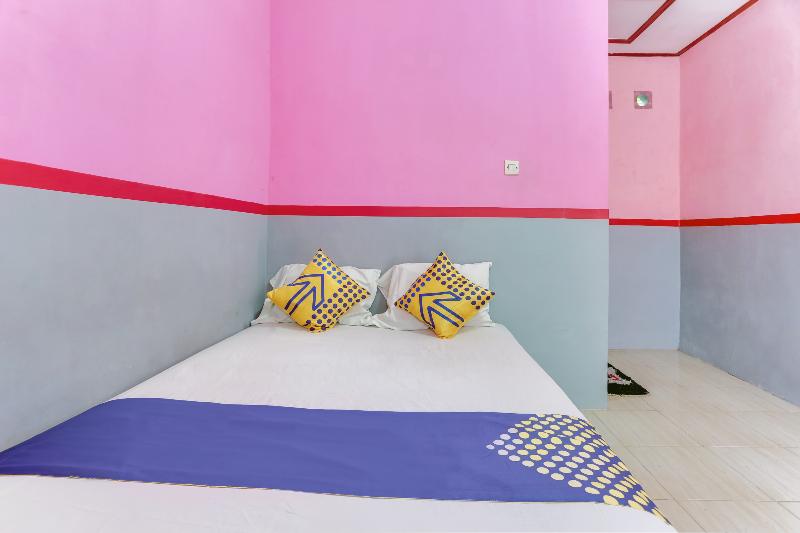Ijen Traveller Homestay by ZUZU - Oda