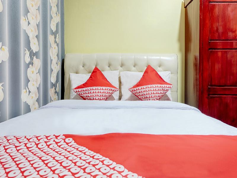OYO 2595 Hotel Jinan Makassar - Oda