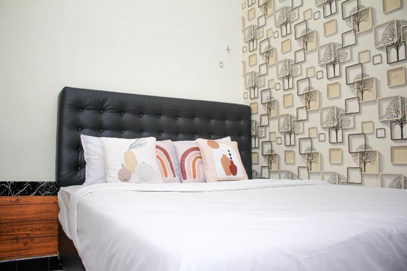 Capital O 2258 Santana Syariah Guest House - Oda
