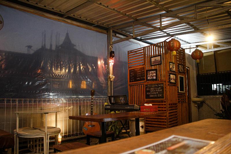 Capital O 2258 Santana Syariah Guest House - Restoran