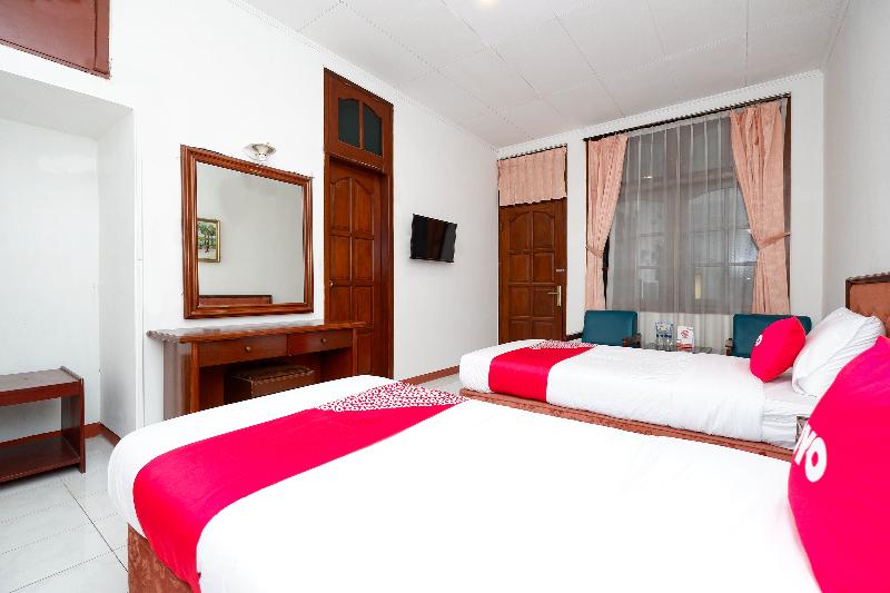 Oyo 1644 Hotel Griya Kencana - Oda