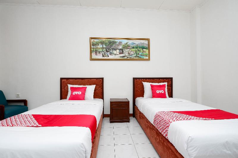 Oyo 1644 Hotel Griya Kencana - Oda