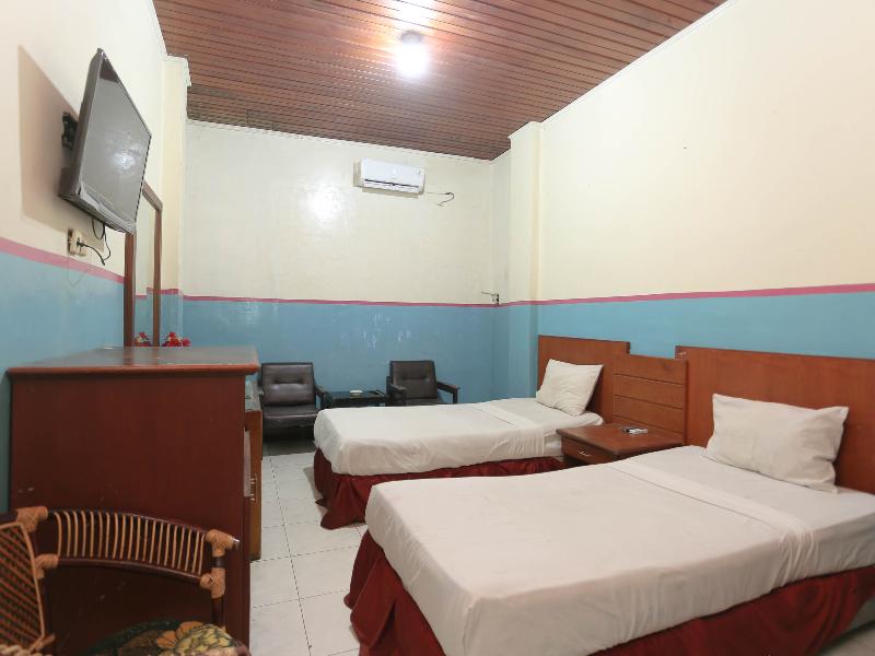 2057 Hotel Kharisma - Oda