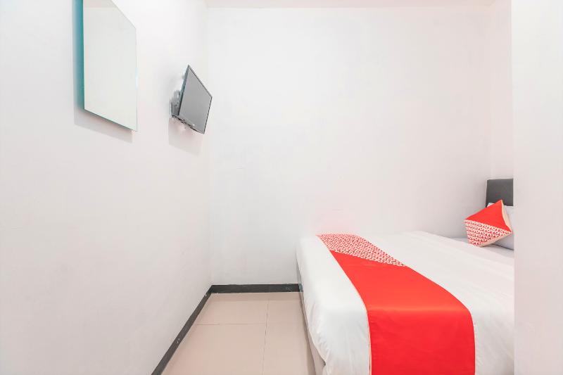 Super OYO 2223 J&b Room Utan Kayu - Oda