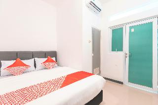 Super OYO 2223 J&b Room Utan Kayu fotoÄŸrafÄ±