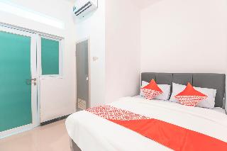 Super OYO 2223 J&b Room Utan Kayu fotoÄŸrafÄ±