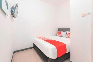 Super OYO 2223 J&b Room Utan Kayu fotoÄŸrafÄ±