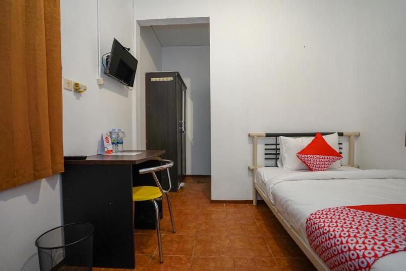 Super OYO 1844 Bravo Residence - Oda