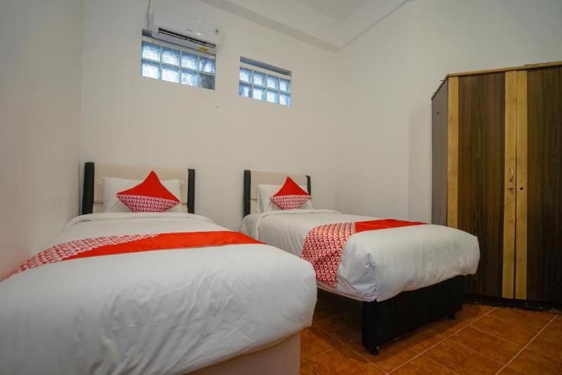 Super OYO 1844 Bravo Residence - Oda