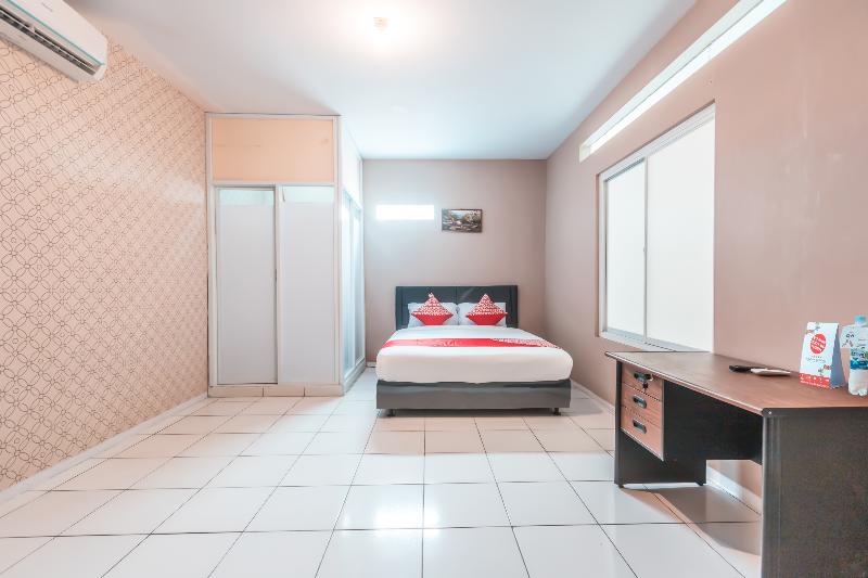 Super OYO 1868 J&b Room Pramuka - Oda