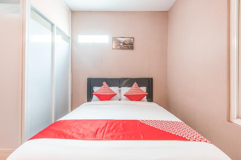 Super OYO 1868 J&b Room Pramuka - Oda