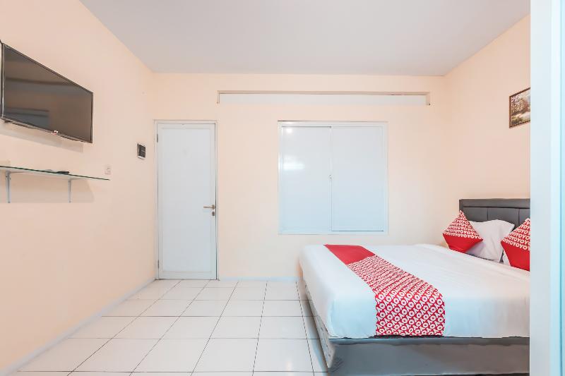 Super OYO 1868 J&b Room Pramuka - Oda