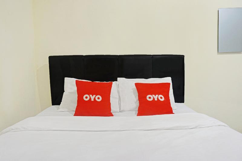 Super OYO 1868 J&b Room Pramuka - Oda
