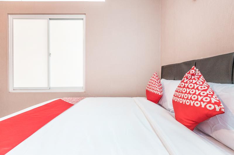 Super OYO 1868 J&b Room Pramuka - Oda