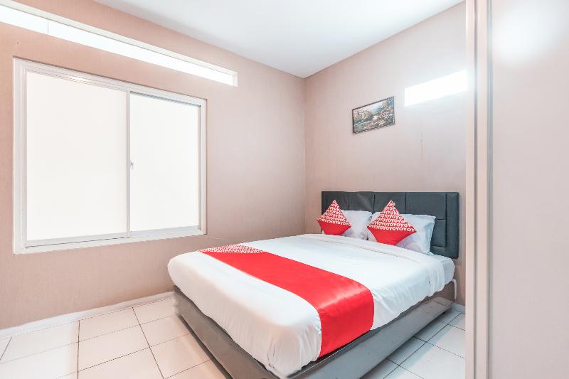 Super OYO 1868 J&b Room Pramuka - Oda