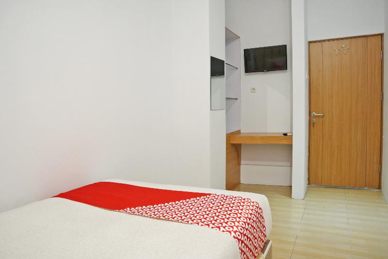 Oyo 1673 M Authentic Kost Man - Oda