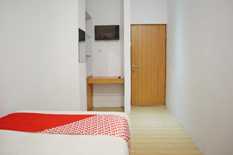 Oyo 1673 M Authentic Kost Man - Oda