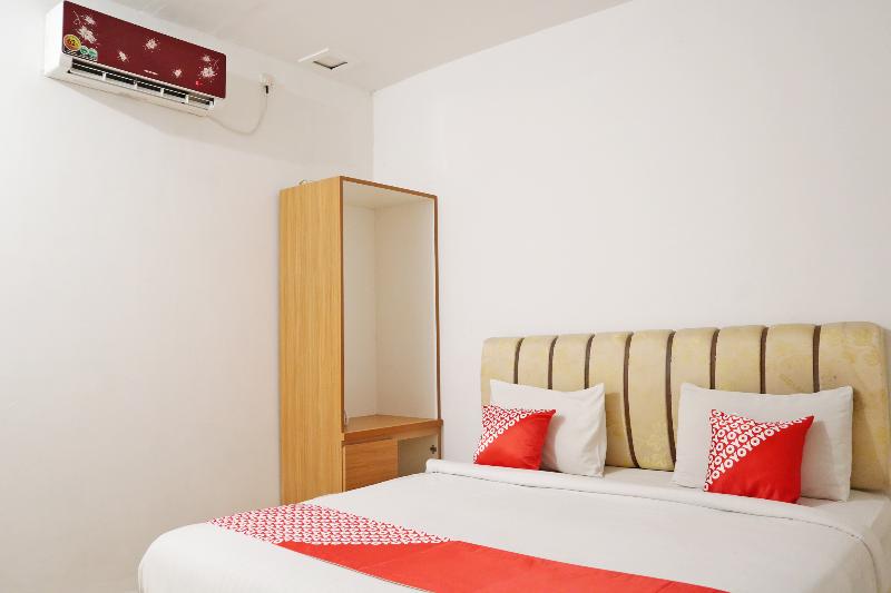 Oyo 1673 M Authentic Kost Man - Oda
