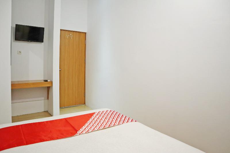 Oyo 1673 M Authentic Kost Man - Oda