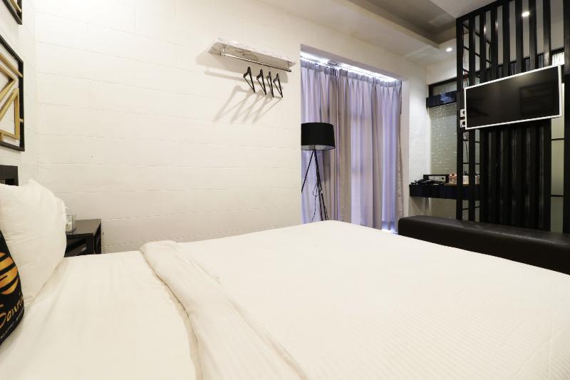 Hotel Sanrina Makassar by ZUZU - Oda