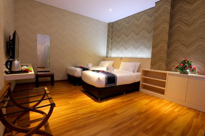 Grand Singgie Hotel managed by Asatel - Oda