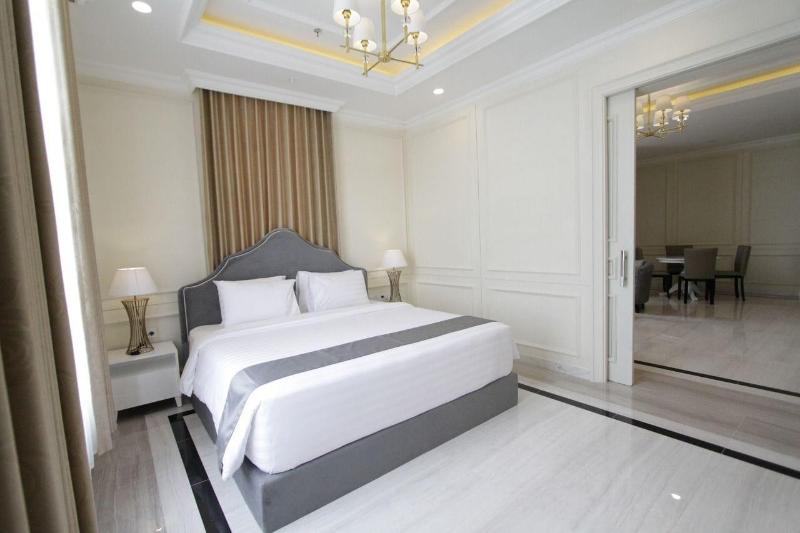Grand Senyum Hotel - Oda
