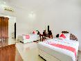 Super OYO 3261 Hotel Ratu oda fotoğrafı