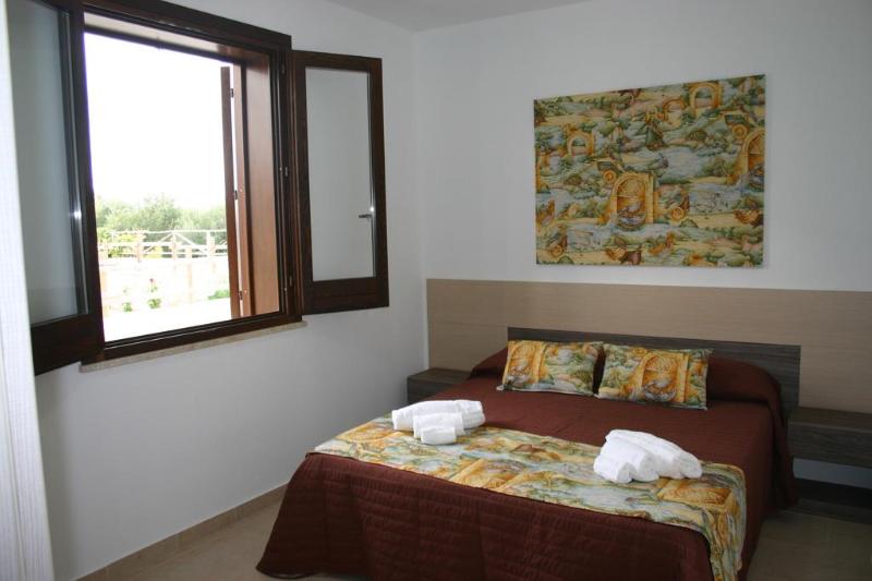Oasi Guzzetta Hotel e Case Vacanze - Oda