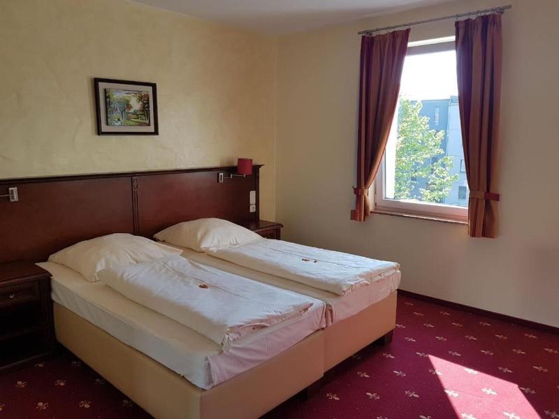 Hotel Medaillon - Oda
