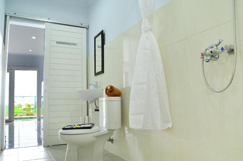 Villa Tangtu Beach Inn - Oda