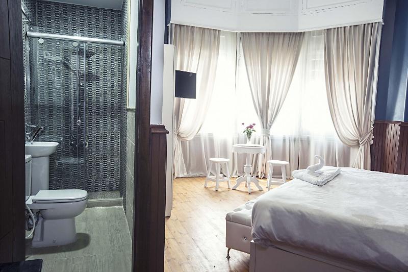 Tahrir Plaza Suites - Oda