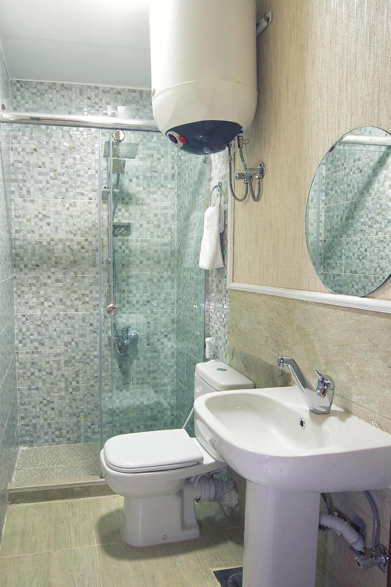Tahrir Plaza Suites - Oda