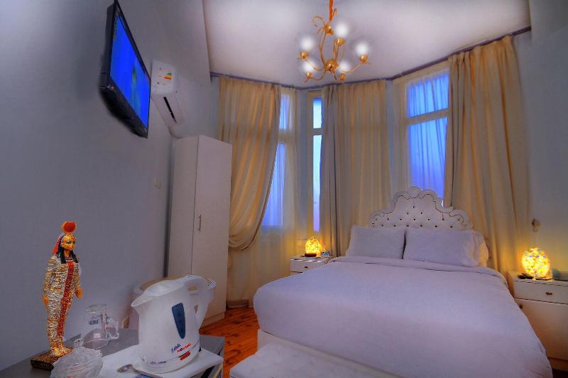 Tahrir Plaza Suites - Oda